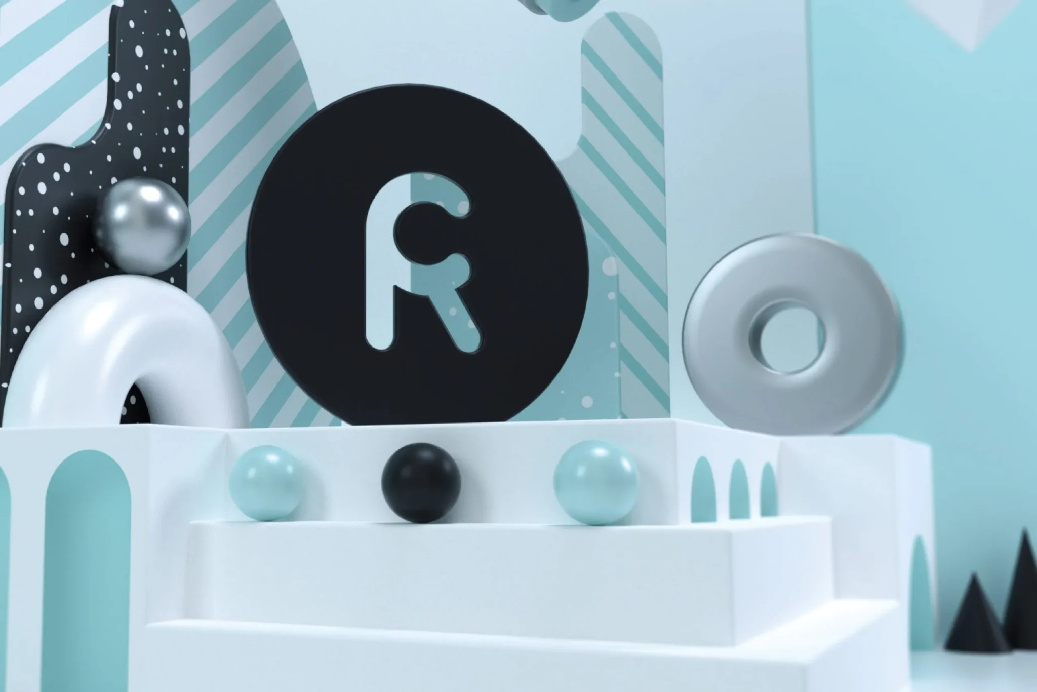 Tight crop of the Retail Creations 3D scene: black R disc, silver ring and teal and black spheres on white steps