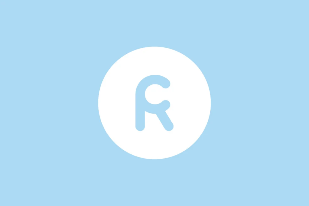 Retail Creations R brandmark in light blue inside a white circle on a light blue background