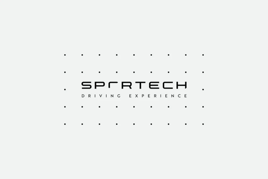 Sportech Driving Experience logo in black on light grey, framed by a grid of small dots