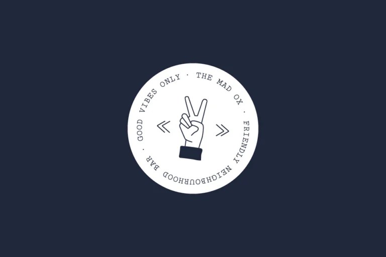 The Mad Ox round badge: peace-sign hand ringed by 'Good vibes only' and 'Friendly neighbourhood bar', on navy