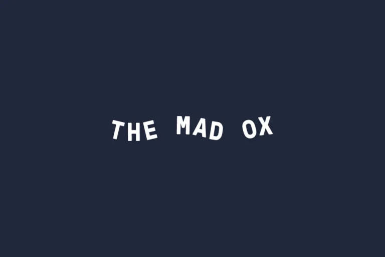 The Mad Ox wordmark in playful, slightly tilted white capitals on dark navy